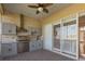 Outdoor kitchen featuring granite countertops and stainless steel appliances at 1280 Osprey Landing Dr, Lakeland, FL 33813