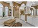Spacious bathroom with a soaking tub, shower, and double vanity at 1501 Sunset Pointe Pl, Kissimmee, FL 34744