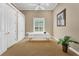 Large bedroom with plenty of closet space and a massage table at 1501 Sunset Pointe Pl, Kissimmee, FL 34744