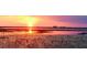Picturesque sunset view over the lake at 1501 Sunset Pointe Pl, Kissimmee, FL 34744