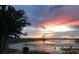 Scenic sunset reflecting on the lake at 1501 Sunset Pointe Pl, Kissimmee, FL 34744