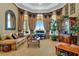 Relaxing living room with large windows and water views at 1501 Sunset Pointe Pl, Kissimmee, FL 34744