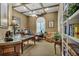 Home office with built-in bookshelves and a large desk at 1501 Sunset Pointe Pl, Kissimmee, FL 34744