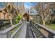 Inviting condo entrance with a charming walkway at 1621 Ne 2Nd St # 203, Ocala, FL 34470