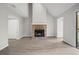 Brick fireplace in a light and airy living room at 1621 Ne 2Nd St # 203, Ocala, FL 34470