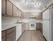 Updated kitchen, white appliances, taupe cabinets at 1621 Ne 2Nd St # 203, Ocala, FL 34470