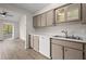 Kitchen with light cabinets and dishwasher at 1621 Ne 2Nd St # 203, Ocala, FL 34470