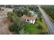 Aerial view showing condo building near road and orchard at 2 Buck Cir # 2, Haines City, FL 33844