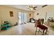 Bright living room with tile floors and sliding glass doors at 551 Albatross Dr, Poinciana, FL 34759