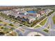 Wide aerial view of the townhome community and surrounding area at 9475 Randal Park Blvd, Orlando, FL 32832