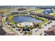 Community pool with surrounding patio and seating at 9475 Randal Park Blvd, Orlando, FL 32832
