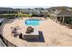 Community pool with expansive deck and seating at 9475 Randal Park Blvd, Orlando, FL 32832