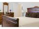 Bedroom with wooden bed frame and dresser at 3112 Armstrong Spring Dr, Kissimmee, FL 34744