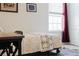 Bedroom with twin bed, desk and window at 3112 Armstrong Spring Dr, Kissimmee, FL 34744
