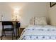 Small bedroom with twin bed, desk, and chair at 3112 Armstrong Spring Dr, Kissimmee, FL 34744