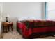 Bedroom with a wooden nightstand and full-sized bed at 3112 Armstrong Spring Dr, Kissimmee, FL 34744