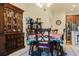 Elegant dining room with a formal table and hutch at 3112 Armstrong Spring Dr, Kissimmee, FL 34744