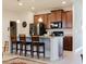 Modern kitchen with granite countertops and stainless steel appliances at 3112 Armstrong Spring Dr, Kissimmee, FL 34744