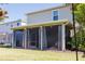 Large screened porch with plenty of space for relaxation at 3112 Armstrong Spring Dr, Kissimmee, FL 34744