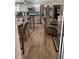 Modern kitchen with island and stainless steel appliances at 4040 Ne 95Th Rd, Wildwood, FL 34785