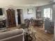 Open dining area with adjacent living space and kitchen at 4040 Ne 95Th Rd, Wildwood, FL 34785