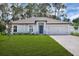 Image 1 of 12: 89 Orchid Ln, Poinciana