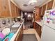 Galley-style kitchen with updated appliances and storage at 6106 Pine Nw Ave, Lakeland, FL 33810