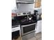Kitchen with stove, oven and dark countertop at 139 Oak View Pl, Sanford, FL 32773