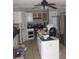 Kitchen with island, stainless steel appliances, and white cabinets at 139 Oak View Pl, Sanford, FL 32773