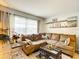 Relaxing living room featuring a spacious sectional sofa and coffee table at 9460 Sw 84Th Ter # F, Ocala, FL 34481