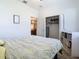 Bedroom with a queen bed and walk-in closet at 590 Tanaro Ln, Haines City, FL 33844