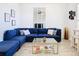 Bright living room with sectional sofa and coffee table at 590 Tanaro Ln, Haines City, FL 33844