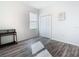 Simple bedroom with wood floors and a double door closet at 590 Tanaro Ln, Haines City, FL 33844