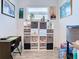 Home office space with built-in shelving and a workspace at 590 Tanaro Ln, Haines City, FL 33844