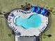 Bird's-eye view of the community pool and surrounding area at 590 Tanaro Ln, Haines City, FL 33844