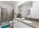 Double vanity bathroom with walk-in shower at 2901 Protagonist St, Kissimmee, FL 34746