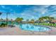 Large resort-style pool with lounge chairs at 2901 Protagonist St, Kissimmee, FL 34746