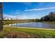 Tranquil lake view with walking path and lush greenery at 2901 Protagonist St, Kissimmee, FL 34746
