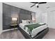 Elegant bedroom with a plush bed and gray accents at 2901 Protagonist St, Kissimmee, FL 34746