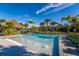 Resort-style pool with a lazy river and palm trees at 2901 Protagonist St, Kissimmee, FL 34746