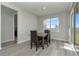 Bright dining area with sliding glass doors to backyard at 1991 Spring Shower Cir, Kissimmee, FL 34744