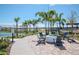 Relaxing fire pit area with seating and pickleball courts at 1991 Spring Shower Cir, Kissimmee, FL 34744