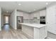 Modern kitchen with stainless steel appliances and white cabinets at 1991 Spring Shower Cir, Kissimmee, FL 34744
