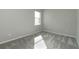 Bright bedroom with neutral walls and carpet flooring at 1991 Spring Shower Cir, Kissimmee, FL 34744