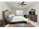 Spacious bedroom with king-size bed and large dresser at 1991 Spring Shower Cir, Kissimmee, FL 34744