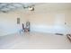 Attached garage with ample space and epoxy flooring at 1991 Spring Shower Cir, Kissimmee, FL 34744