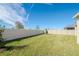Large backyard with a privacy fence and grassy area at 1991 Spring Shower Cir, Kissimmee, FL 34744