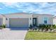 Beautiful new home with landscaping at 1991 Spring Shower Cir, Kissimmee, FL 34744