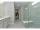 Modern bathroom with walk-in shower and built-in bench at 1991 Spring Shower Cir, Kissimmee, FL 34744
