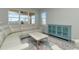 Cozy living room with sectional sofa and stylish media cabinet at 1991 Spring Shower Cir, Kissimmee, FL 34744